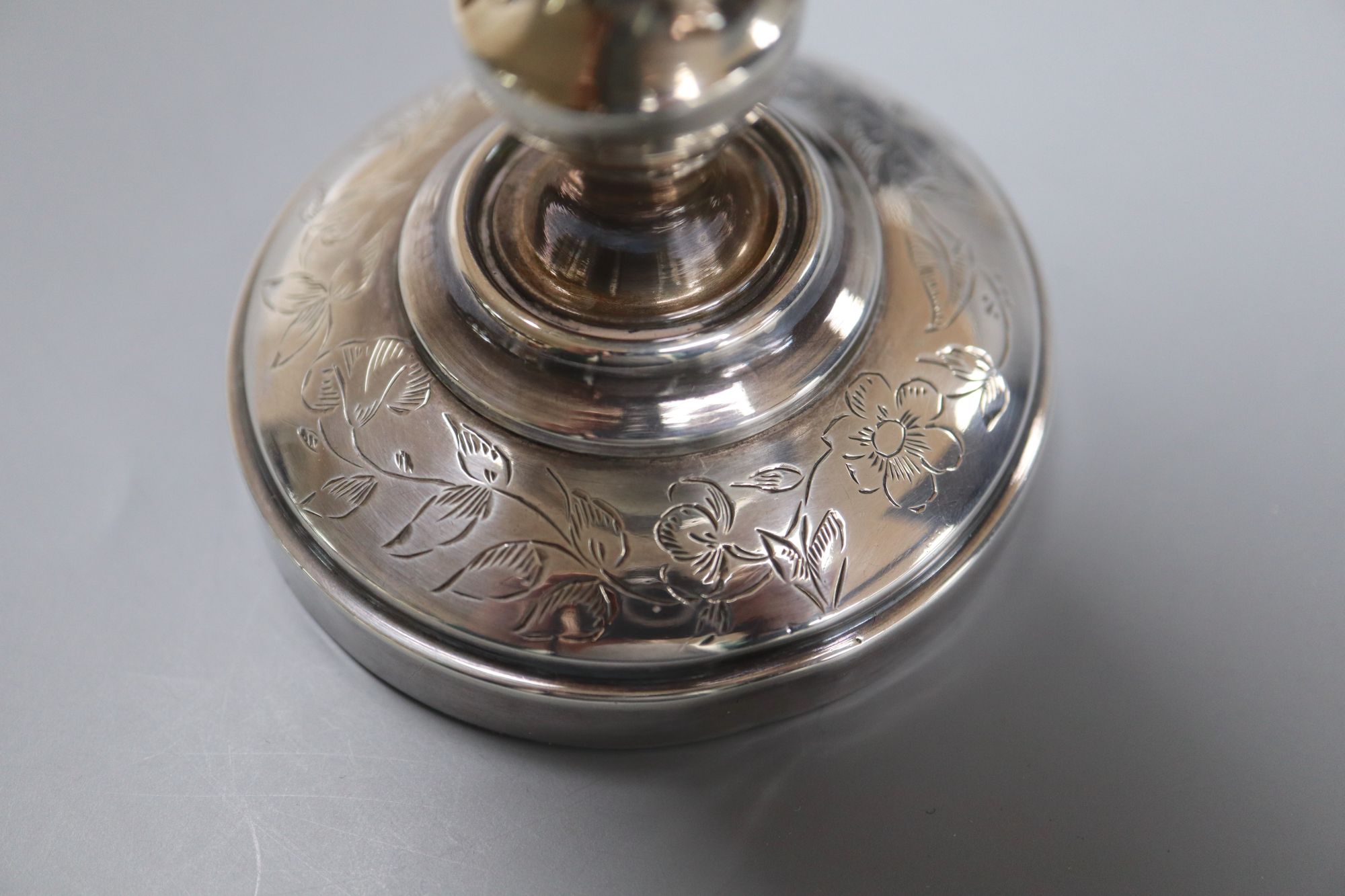 A George V silver sauceboat, a French white metal goblet(repaired) and seven assorted 19th century silver teaspoons,